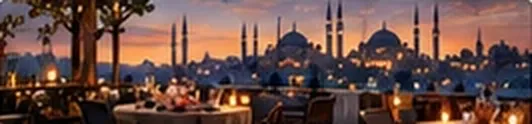 Candle-lit dinner tables facing the old city skyline